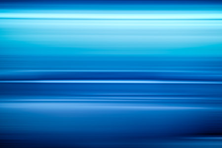 Abstract blue light trails motion blurの写真素材