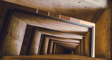 Artistic spiral staircase seen from aboveの写真素材