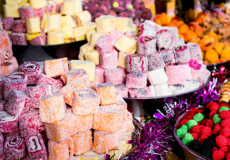 Colorful jelly mix sugar roll up sweet jelly and flavor fruitの写真素材