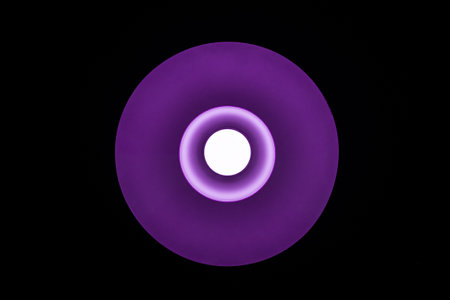Electric round purple lamp with led bulb, bottom upの写真素材