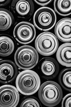 Group of used disposable drain batteries of various sizeの写真素材