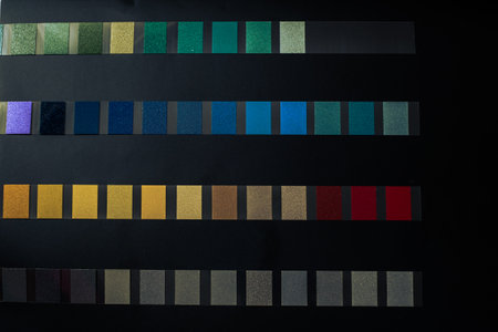 Modern design with geometric colors shape lights on blackの写真素材