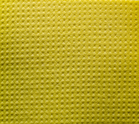 Sponge for washing dishes as a backdropの写真素材