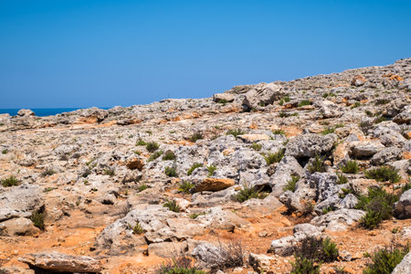 Rough coastline of Comino island, Maltaの写真素材