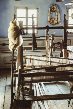 Sibiu city, Romania - August 17, 2019. Traditional Romanian folk house interior with rural furniture and decoration. Astra Museum of Traditional Folk Civilization, Sibiuのeditorial素材