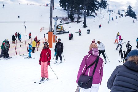 Paltinis Arena Platos, Romania - January 11, 2020. Lots of people on a mountain slope at ski resort in Paltinis Arena Platos. Paltinis Arena Platos is a most popular ski resort in Sibiu, Romaniaのeditorial素材