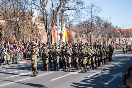 Sibiu, Romania - December 1, 2019. Military Parade on National Day of Romania, 1 December, on Corneliu Coposu Boulevard from Sibiu centerのeditorial素材
