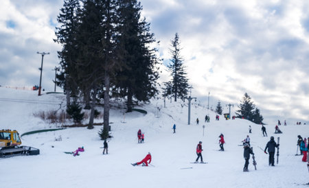 Paltinis Arena Platos, Romania - January 11, 2020. Lots of people on a mountain slope at ski resort in Paltinis Arena Platos. Paltinis Arena Platos is a most popular ski resort in Sibiu, Romaniaのeditorial素材