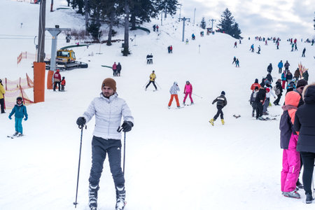 Paltinis Arena Platos, Romania - January 11, 2020. Lots of people on a mountain slope at ski resort in Paltinis Arena Platos. Paltinis Arena Platos is a most popular ski resort in Sibiu, Romaniaのeditorial素材