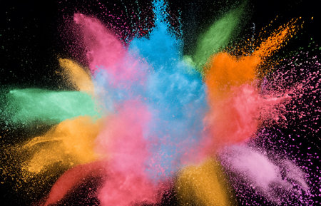 Colored powder explosion on a dark backgroundの素材