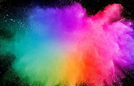 Colored powder explosion on a dark backgroundの素材