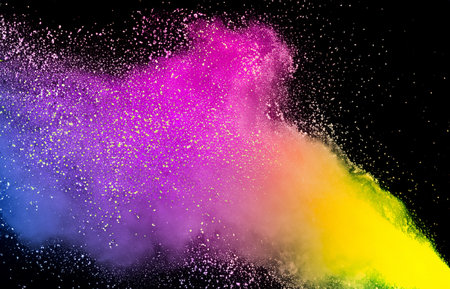 Colored powder explosion on a dark backgroundの素材
