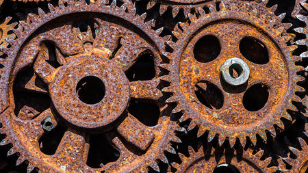 many old rusty metal gears or machine partsの素材