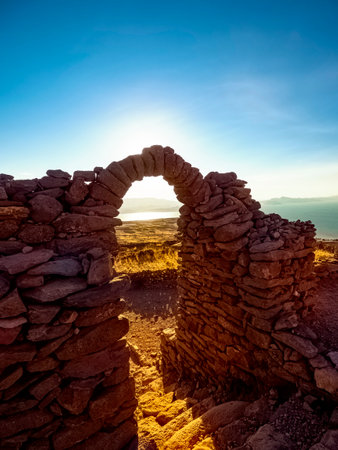 A gate leading to the Pachatata temple, in Amantani island, in Titicaca lake, Peruの写真素材