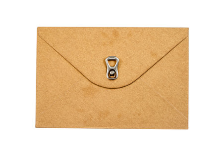 brown vintage paper envelope with old metallic soda Can ring pull isolated on the whiteの写真素材