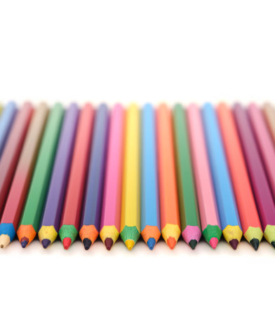 colored wooden pencils on white backgroundの写真素材