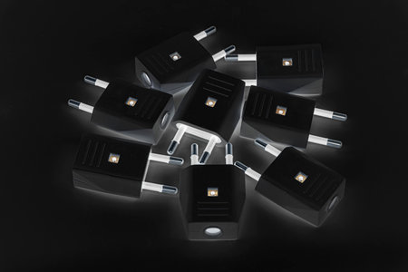 black power plugs on dark backgroundの写真素材