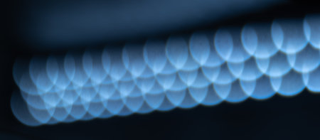blured defocused led lights on dark backgroundの写真素材