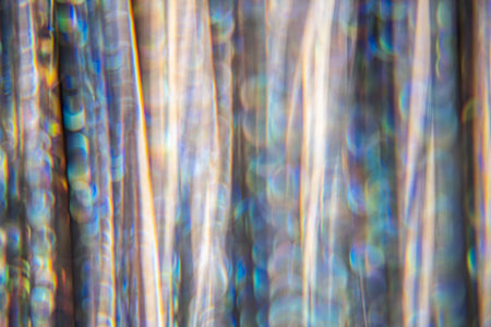 defocused glitter shiny blurry sparkles backgroundの写真素材