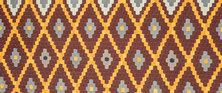 decorative roof with beautiful pattern of colorful glazed tilesの写真素材