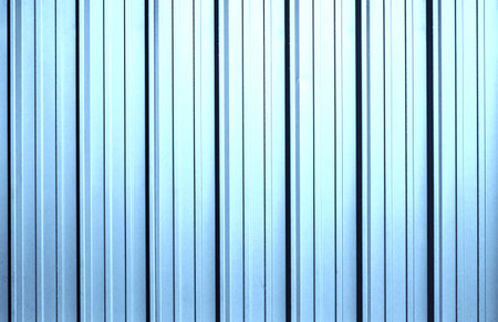 corrugated blue metal sheet texture backgroundの写真素材