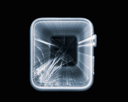 electronic watch with broken glass, zoom blurの写真素材