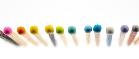 matchsticks various colors on white background, selective focusの写真素材