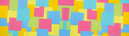 Multicolored sticky paper notes texture background, full frame