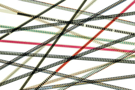 old 8mm cine film on white backgroundの写真素材