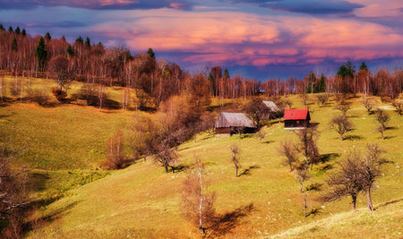 Romanian old sheepfold on the top of the hill in the fall season, Fantanele village, Sibiu county, Cindrel mountains, 1100m, Romaniaの写真素材