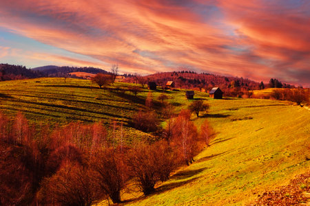 Romanian old sheepfold on the top of the hill in the fall season, Fantanele village, Sibiu county, Cindrel mountains, 1100m, Romaniaの写真素材