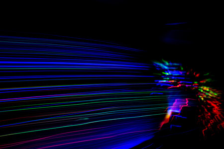 speed light line motion blur on dark backgroundの写真素材