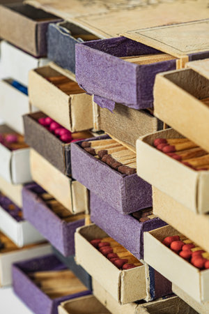 Vintage old used matchboxes stackedの写真素材