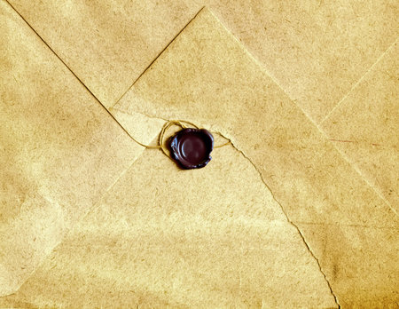 vintage paper envelope with wax seal with stringの写真素材