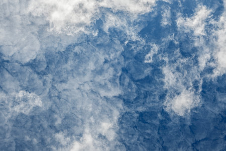 white clouds in the blue skyの写真素材