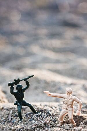 Toy soldier in ground warの写真素材