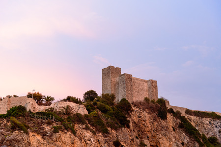 The fortress of Talamone at sunset, Italyの写真素材