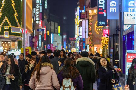 SEOUL, SOUTH KOREA - DECEMBER 31, 2016 - The crowd of people that drives one of the main streets of Seoul during the holiday seasonのeditorial素材