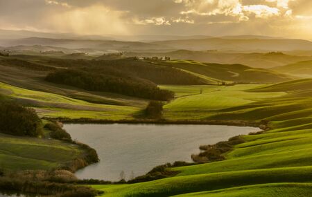 Aerial view of the "Crete Senesi", near Asciano, Tuscany at sunsetの写真素材