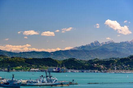 LA SPEZIA, ITALY - APRIL 29, 2017 - View of the port of La Spezia with boats and mountains at the horizon.のeditorial素材