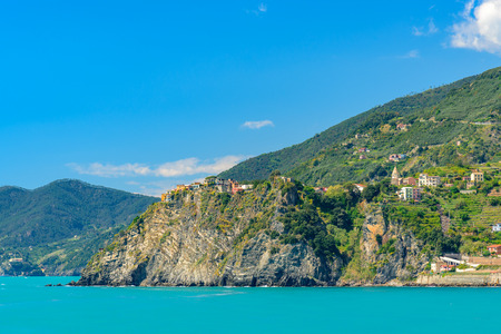 Scenic view of the mediterrean sea and a town inside the Cinque Terre National Park, Liguria, Italy from the cliffs near Manarola.の写真素材