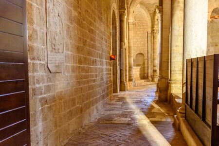 MONTALCINO, ITALY - JULY 22, 2017 - The side nave of the ancient Romanesque church of Sant'Antimo near Montalcino in Tuscanyのeditorial素材