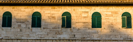 BAGNO VIGNONI, ITALY - JULY 23, 2017 - Deatil of an ancient building in Bagno Vignoni a small village in Val d'Orcia.の写真素材