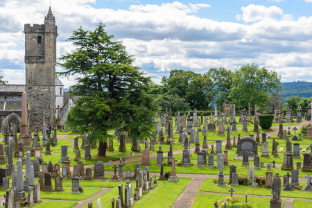 STRILING - UNITED KINGDOM - AUGUST 9, 2017 - View of cemetery near Stirling Castle in Scotland with some tourists visiting itのeditorial素材