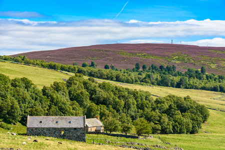 BRAEMAR, SCOTLAND - AUGUST 10, 2017 - An abandoned building along a road in the Cairngorms National Park in Scotland.のeditorial素材