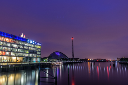 GLASGOW, SCOTLAND - AUGUST 15, 2017 - Night lights reflection in Glasgow City near the headquarters of BBC Scotland..のeditorial素材
