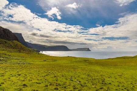 Cliffs of Neist Point, rugged and rocky coast on the Isle of Skye, in Scotland.