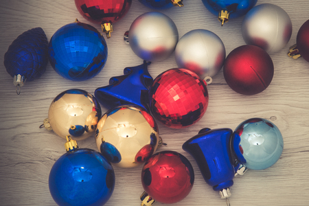 Colorful Christmas balls on wooden background.の写真素材