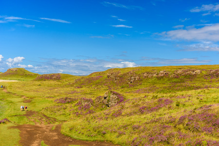 Isle of Skye, Scotland - August 12, 2017: Tourists walk on the Coral Beach in the Isle of Skye.のeditorial素材