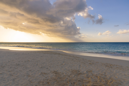 View of a tropical caribbean beach at sunset.の写真素材